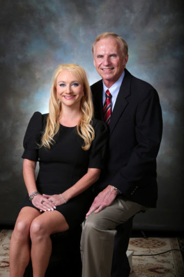 Professional image of Roger and his daughter Hilary hegwood sitting together.